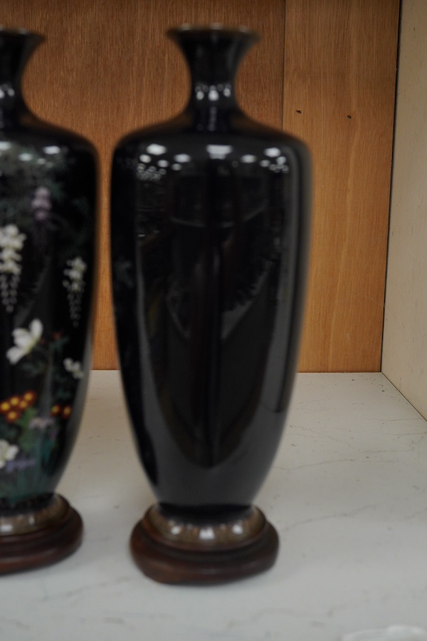 A pair of Japanese silver wire cloisonné enamel vases, Meiji period, wood stands, 18cm high